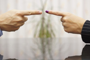 man and woman  pointing fingers at each other. Conflict concept